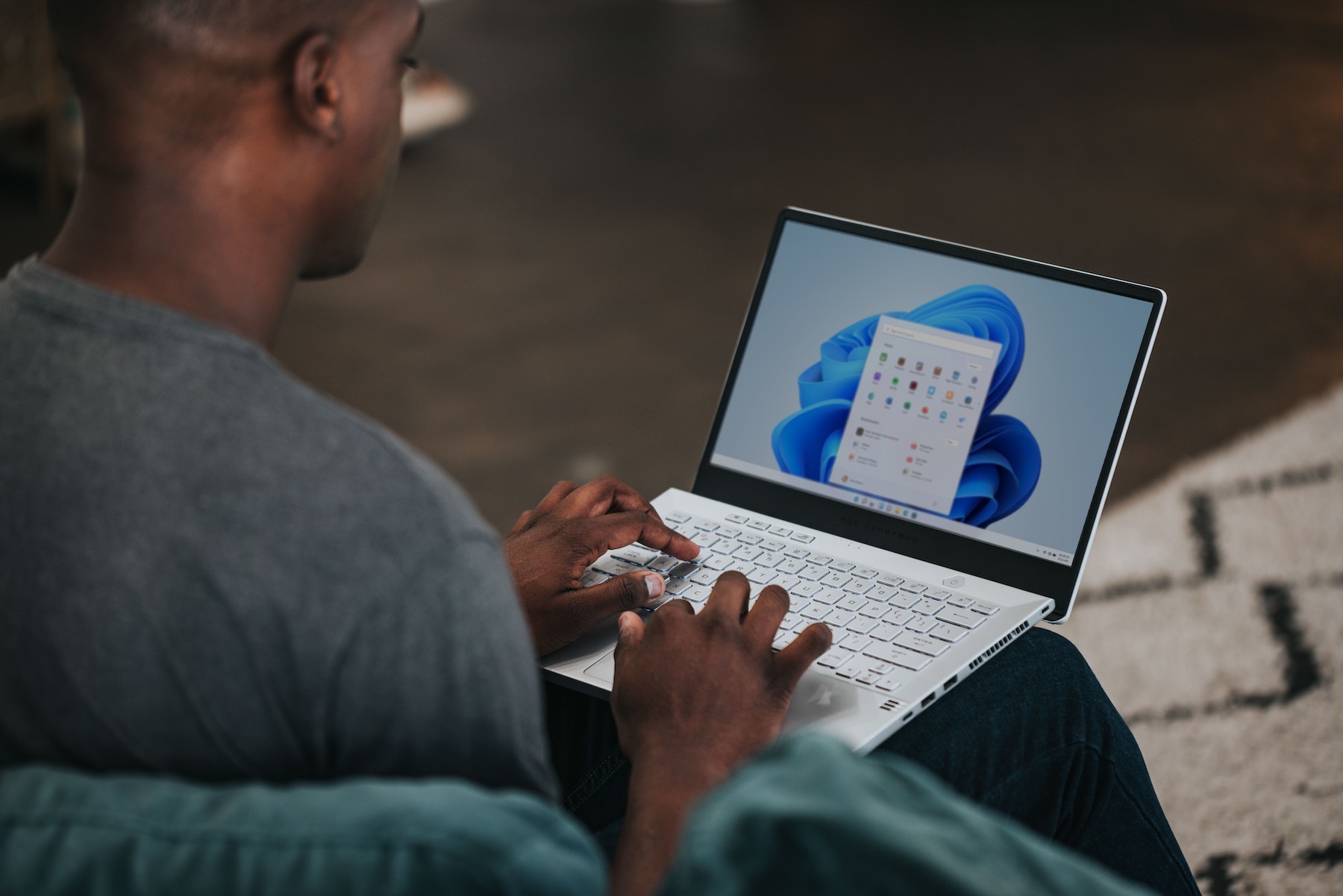 Man using microsoft applications on his laptop